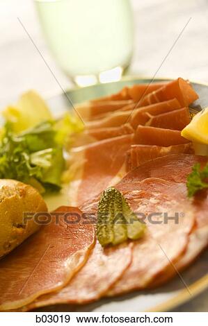 Stock Photo - Closeup of deli meat appetizer. Fotosearch