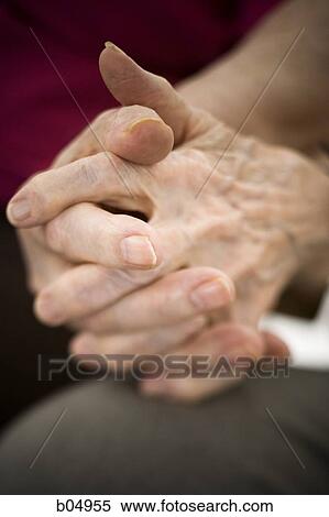 Closeup of elderly couple holding hands View Large Photo Image Stock Photography - Closeup of elderly couple holding hands. Fotosearch