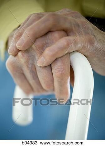 Closeup of elderly male hands on white cane View Large Photo Image Stock Image - Closeup of elderly male hands on white cane. Fotosearch