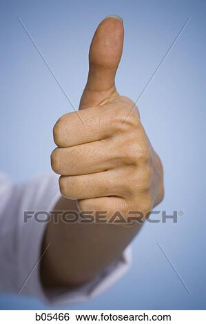 Closeup of female thumb up View Large Photo Image Stock Photograph - Closeup of female thumb up. Fotosearch