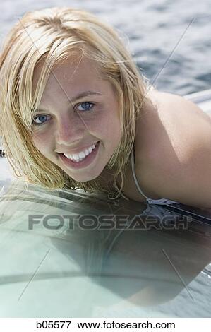 Closeup of girl in water smiling View Large Photo Image Stock Photo - Closeup of girl in water smiling. Fotosearch
