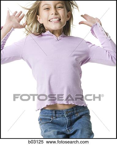 Stock Photography - Closeup of girl jumping. Fotosearch