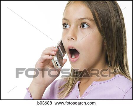 Closeup of girl on cell phone View Large Photo Image Stock Photo - Closeup of girl on cell phone. Fotosearch