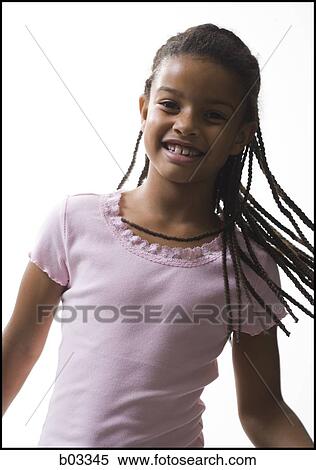 Closeup of girl swinging braids View Large Photo Image Stock Photography - Closeup of girl swinging braids. Fotosearch