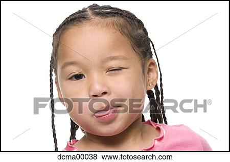 Stock Photo - Closeup of girl winking. Fotosearch