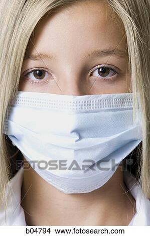 Closeup of girl with surgical mask View Large Photo Image Picture - Closeup of girl with surgical mask. Fotosearch