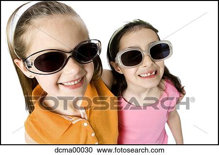 Stock Image - Closeup of girls with sunglasses. Fotosearch