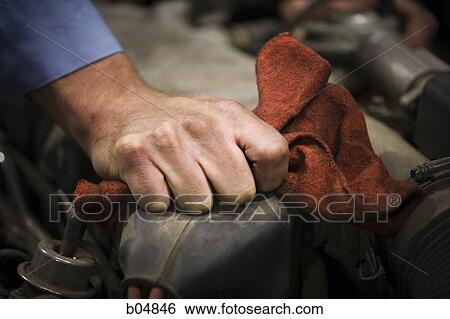 Closeup of male hand with dirty rag View Large Photo Image Stock Photograph - Closeup of male hand with dirty rag. Fotosearch