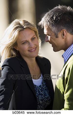 Closeup of man and woman smiling View Large Photo Image Stock Photography - Closeup of man and woman smiling. Fotosearch