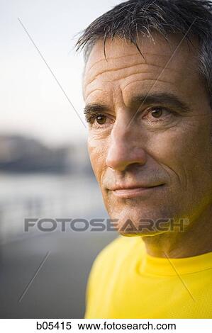 Closeup of mature man outdoors View Large Photo Image Stock Photography - Closeup of mature man outdoors. Fotosearch