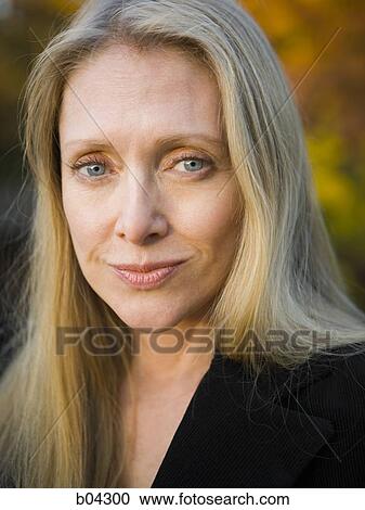 Closeup of mature woman smiling View Large Photo Image Stock Image - Closeup of mature woman smiling. Fotosearch