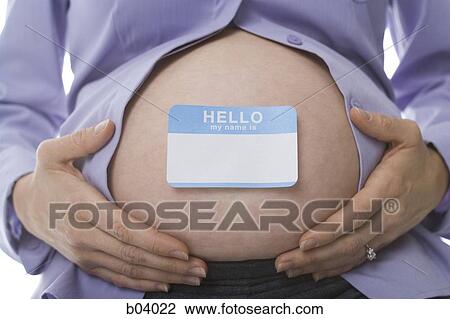 Closeup of pregnant belly with blank nametag View Large Photo Image Stock Image - Closeup of pregnant belly with blank nametag. Fotosearch