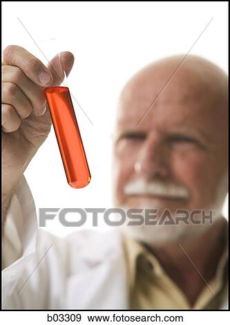 Closeup of scientist with test tube View Large Photo Image Stock Photo - Closeup of scientist with test tube. Fotosearch