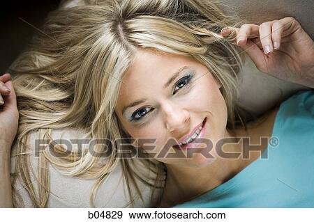 Stock Photo - Closeup of sexy woman lying down. Fotosearch