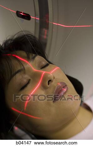 Closeup of woman entering MRI machine View Large Photo Image Stock Photo - Closeup of woman entering MRI machine. Fotosearch