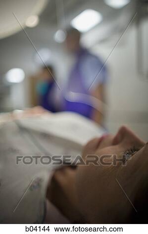 Closeup of woman on diagnostic bed View Large Photo Image Picture - Closeup of woman on diagnostic bed. Fotosearch