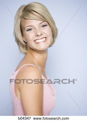 Closeup of woman smiling View Large Photo Image Stock Photo - Closeup of woman smiling. Fotosearch