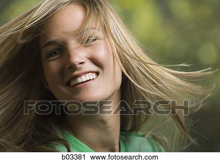 Closeup of woman swinging hair View Large Photo Image Stock Image - Closeup of woman swinging hair. Fotosearch