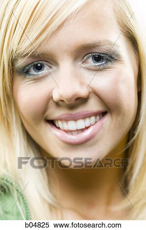 Closeup of woman with blue eyes smiling View Large Photo Image Stock Photography - Closeup of woman with blue eyes smiling. Fotosearch