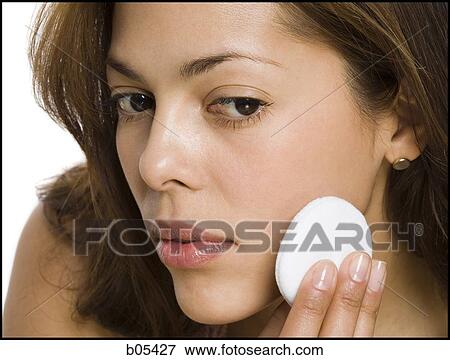 Closeup of woman with powder puff View Large Photo Image Stock Photo - Closeup of woman with powder puff. Fotosearch