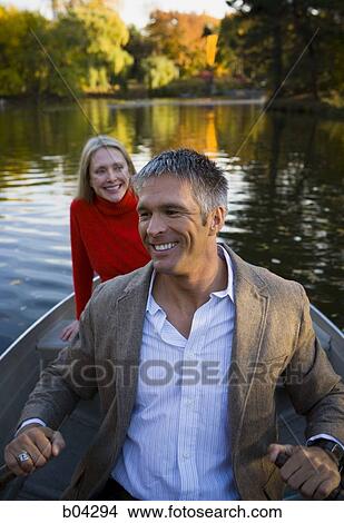Couple in canoe View Large Photo Image Picture - Couple in canoe. Fotosearch