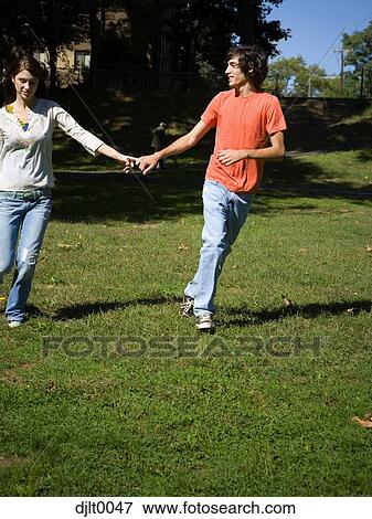 Couple running outdoors View Large Photo Image Stock Photo - Couple running outdoors. Fotosearch