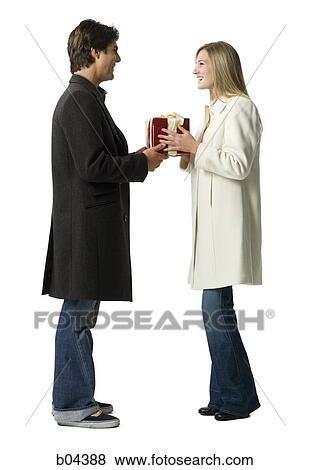Couple with gift boxes View Large Photo Image Stock Photo - Couple with gift boxes. Fotosearch