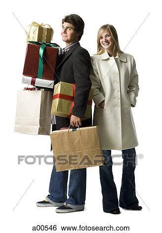 Stock Photograph - Couple with gift boxes. Fotosearch