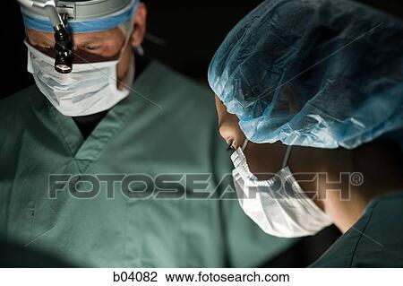 Doctor and nurse in surgery View Large Photo Image Stock Image - Doctor and nurse in surgery. Fotosearch