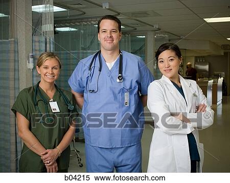 Doctors and nurse posing View Large Photo Image Stock Photography - Doctors and nurse posing. Fotosearch