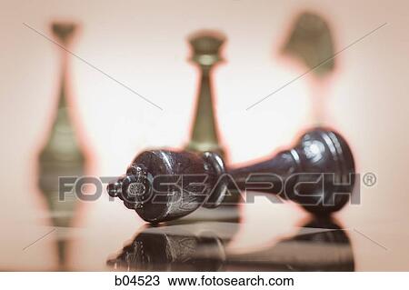 Stock Image - Fallen king chess piece. Fotosearch