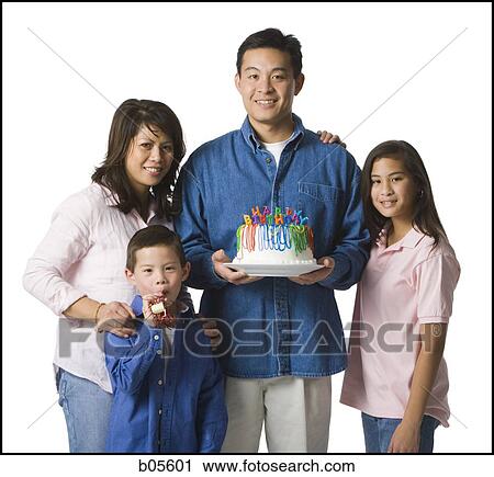 Stock Image - Family birthday celebration. Fotosearch