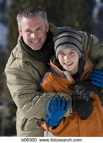 Stock Image - Father and son outside. Fotosearch