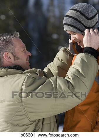 Stock Image - Father and son outside. Fotosearch