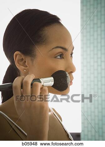 Female grooming herself View Large Photo Image Stock Photo - Female grooming herself. Fotosearch