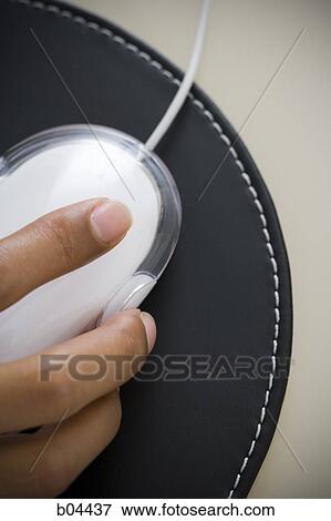 Stock Photo - Female hand on mouse. Fotosearch