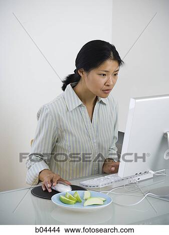Female hand on mouse with keyboard View Large Photo Image Picture - Female hand on mouse with keyboard. Fotosearch