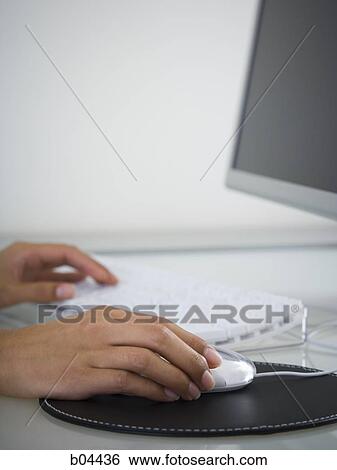 Female hand on mouse with keyboard View Large Photo Image Stock Photograph - Female hand on mouse with keyboard. Fotosearch