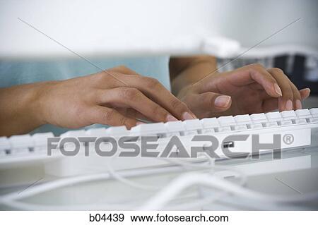 Female hands on keyboard View Large Photo Image Stock Photo - Female hands on keyboard. Fotosearch