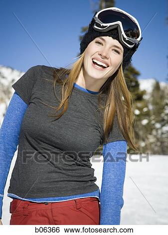 Female outside in the snow laughing View Large Photo Image Stock Photograph - Female outside in the snow laughing. Fotosearch