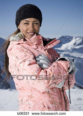 Stock Image - Female outside in the snow. Fotosearch