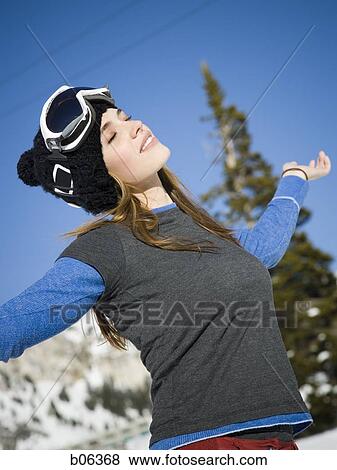 Female outside in the snow View Large Photo Image Stock Photo - Female outside in the snow. Fotosearch