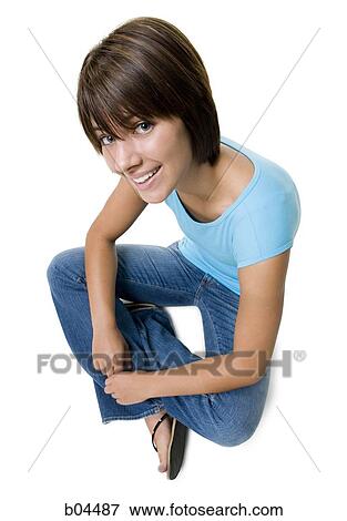 Stock Photo - Female sitting cross legged. Fotosearch
