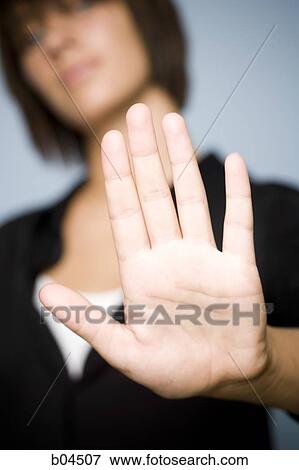Female stop sign View Large Photo Image Stock Photo - Female stop sign. Fotosearch
