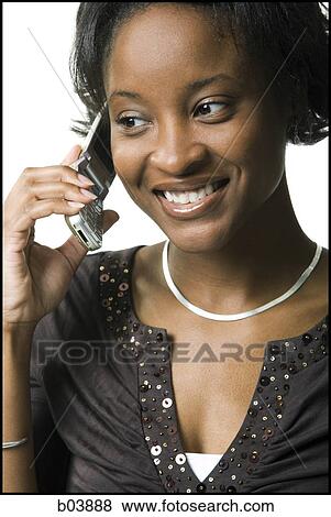 Female talking on cell phone View Large Photo Image Stock Photo - Female talking on cell phone. Fotosearch