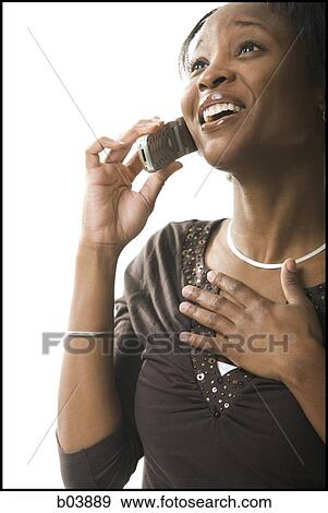 Female talking on cell phone View Large Photo Image Stock Photo - Female talking on cell phone. Fotosearch