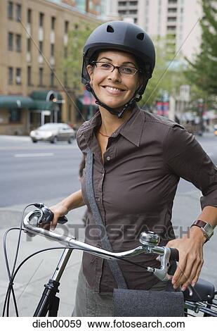 Female with bicycle View Large Photo Image Stock Photo - Female with bicycle. Fotosearch