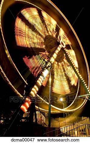 Stock Photo - Ferris wheel at night. Fotosearch