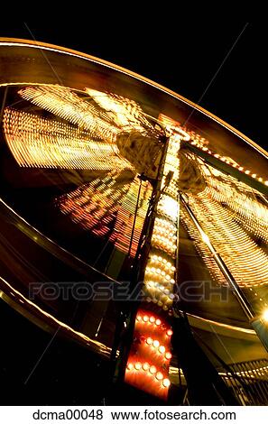 Ferris wheel at night View Large Photo Image Stock Photo - Ferris wheel at night. Fotosearch