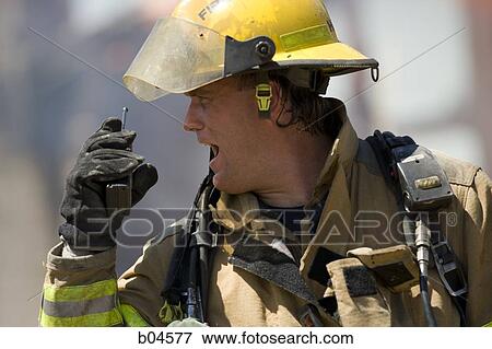 Fire fighter giving instruction View Large Photo Image Stock Photo - Fire fighter giving instruction. Fotosearch